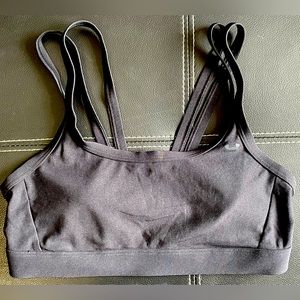 UnderArmour sports bra-size small. Builtin cups & cute straps.  Great condition!